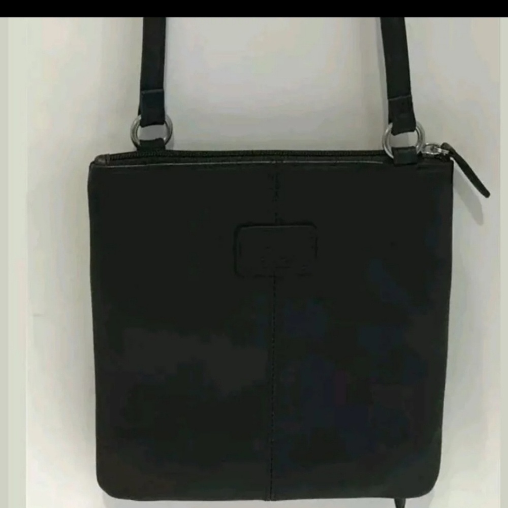 Fossil shoulder strap logo on front . Perfect cond